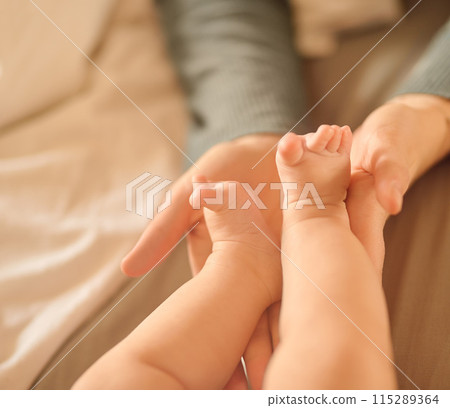 Hands, baby feet and home in bedroom, newborn and family for love, care and nurture. Bonding, support and childhood in person, infant and parent with tiny, toddler and connection, skin and develop Hands, baby feet and home in bedroom, newborn and family for love, care and nurture. Bonding, support and childhood in person, infant and parent with tiny, toddler and connection, skin and develop 115289364