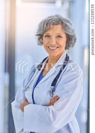Arms crossed, doctor and portrait with mature woman in hospital for healthcare or trust. Cardiology, smile for medical and happy medicine professional with stethoscope in health clinic for treatment Arms crossed, doctor and portrait with mature woman in hospital for healthcare or trust. Cardiology, smile for medical and happy medicine professional with stethoscope in health clinic for treatment 115289539