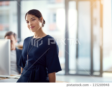 Business woman, portrait and agency with confidence at modern office for entrepreneur career ambition. Young female person or employee with smile for organization, job employment or creative startup 115289948