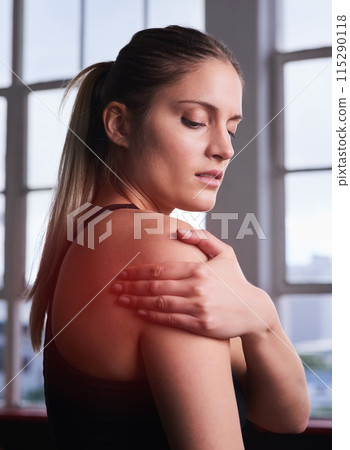 Fitness, hand and shoulder pain with sports woman in gym for workout accident, emergency or mistake. Anatomy, exercise and arm injury with serious athlete in health club for improvement or training 115290118