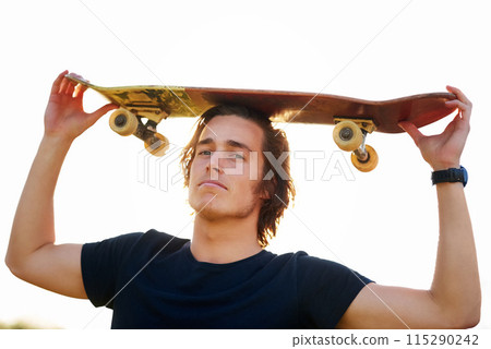 Man, portrait and skateboard on head outdoor for hobby, skill practice and cruising. Male person, relax or rest in summer break ready for urban challenge, travel and extreme sports or freedom 115290242