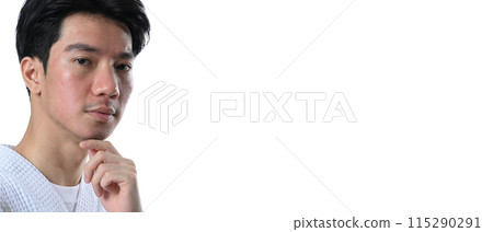 Young Asian man after laser treatment over white background. Medical dermatology concept 115290291