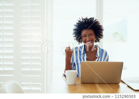 Portrait, black woman and laptop in home with celebration for career success, entrepreneur and fist. African female author, tech and achievement in house with victory, happiness and best selling book 115290303
