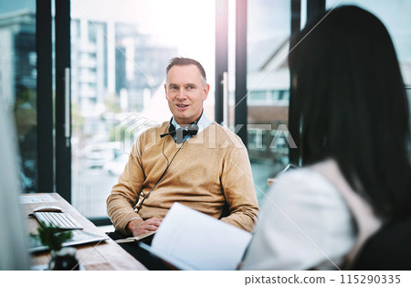 Call centre, office and talking with mentor for coaching on job, communication and learning from manager. Man, woman and speaking for training with notebook at workplace, support for new employee 115290335