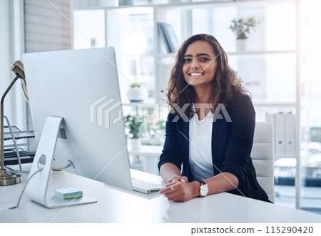 Computer, woman and desk for online work, smile and portrait on internet in workspace. Technology, employee and creative for freelancer web designer, research and editing for agency or business 115290420
