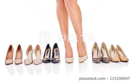 Decision, high heels and legs of woman in studio for fashion sale, shopping or designer footwear with white background. Choice, shoes and female person for luxury items, trendy style or discount Decision, high heels and legs of woman in studio for fashion sale, shopping or designer footwear with white background. Choice, shoes and female person for luxury items, trendy style or discount 115290697