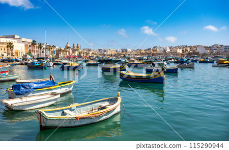 Traditional eyed colorful boats Maltese Luzzu, Marsaxlokk, Malta 115290944