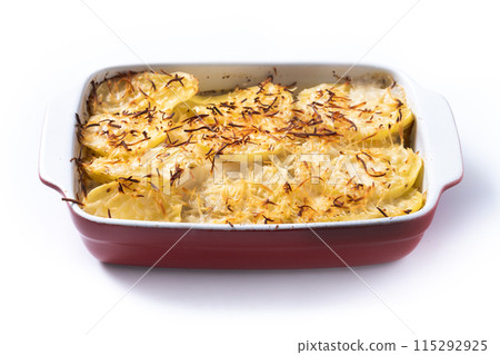 Potato gratin baked with cream and cheese isolated on white background Potato gratin baked with cream and cheese isolated on white background 115292925