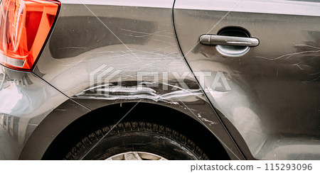 Broken Scratched Bumper Luxury Car Scratched With Deep Damage To Paint. Abandoned Car After Accident In Street Broken Scratched Bumper Luxury Car Scratched With Deep Damage To Paint. Abandoned Car After Accident In Street 115293096