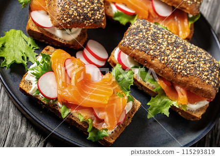 smoked salmon sandwiches on rye bread rolls 115293819
