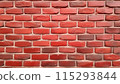 充滿活力、色彩繽紛的磚牆圖案，具有各種深淺的紅色和橙色。 115293844