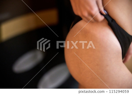 Tanning Technology, Rapid Tan, Professional Tan. Lady is treated to speedy tanning session with innovative apparatus. Tanning Technology, Rapid Tan, Professional Tan. Lady is treated to speedy tanning session with innovative apparatus. 115294059