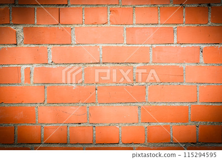 Old and aged red brick wall texture background with vignetting 1 115294595