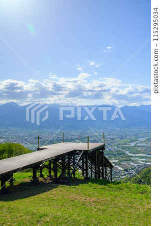 View of Azumidaira and the Northern Alps from the new launch platform on Mt. Nagamine [Azumino City] 115295034