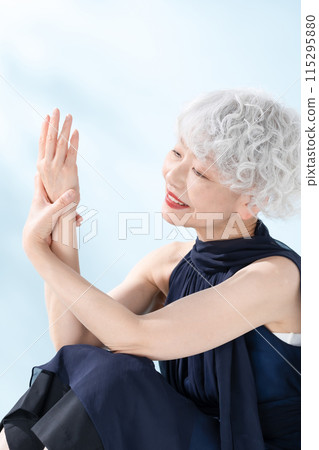 Beauty Senior Woman Sitting 115295880
