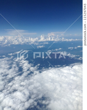Magnificent mountain seen from an airplane 115297043
