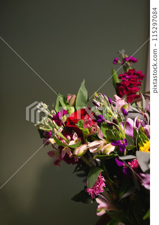 Still life. luxury spring flowers on a black background. color bloom. Low key photo Still life. luxury spring flowers on a black background. color bloom. Low key photo 115297084
