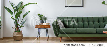 Minimalist living room with a clean and cozy aesthetic, featuring a green fabric sofa 115298800