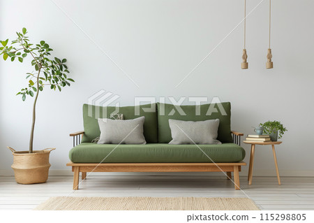 Minimalist living room with a clean and cozy aesthetic, featuring a green fabric sofa 115298805
