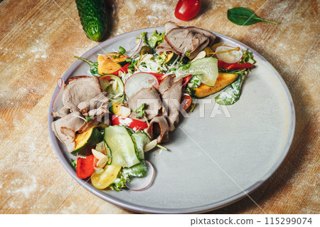 Bounty of Nature: Vibrant Vegetable and Succulent Meat Medley on Rustic Table Bounty of Nature: Vibrant Vegetable and Succulent Meat Medley on Rustic Table 115299074