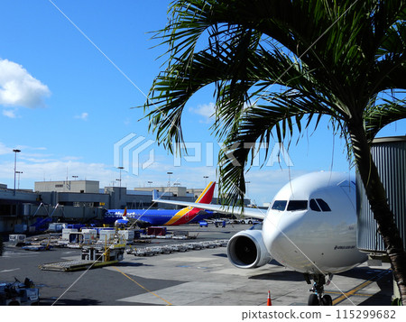 Planes waiting to depart at Honolulu Airport Planes waiting to depart at Honolulu Airport 115299682