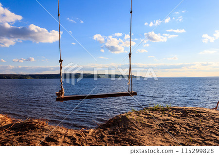 Rope swing on a shore of the Dnieper river in Ukraine 115299828