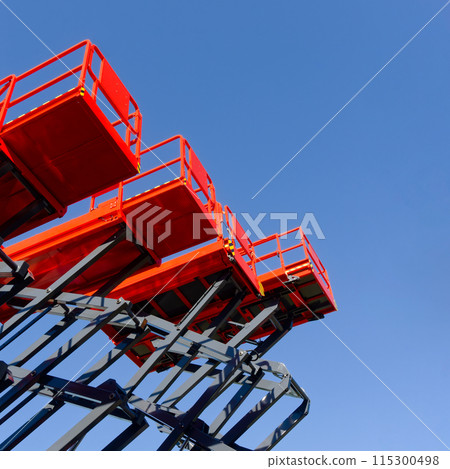 Group of red scissor lifts Group of red scissor lifts 115300498