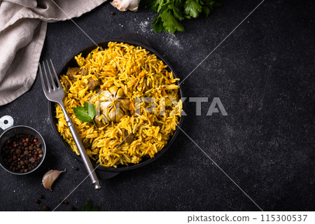 Pilaf, rice with vegetables and lamb meat 115300537