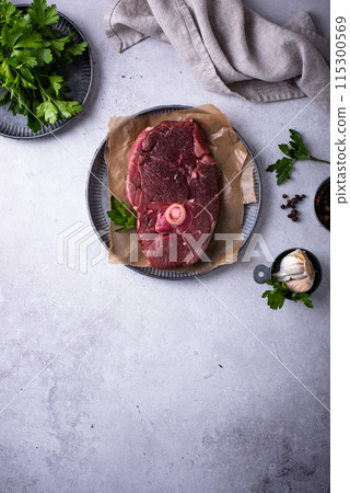 Raw uncooked lamb steak with spices Raw uncooked lamb steak with spices 115300569