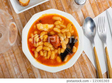 Traditional dish of Spanish cuisine is Fabada soup Traditional dish of Spanish cuisine is Fabada soup 115301303