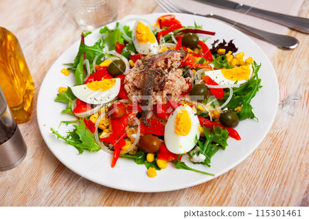 Xato salad with cod, chopped eggs and corn Xato salad with cod, chopped eggs and corn 115301461