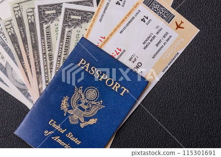 United States of America passport, airline tickets and money 115301691