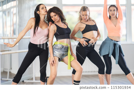 Women improvise, move on whim, and perform voluntary movements high heels dance 115301934