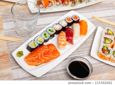 Sushi set with maki rolls and nigiri Sushi set with maki rolls and nigiri 115302082