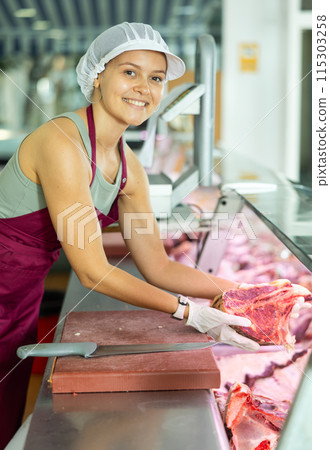 woman behind counter showcases 115303258