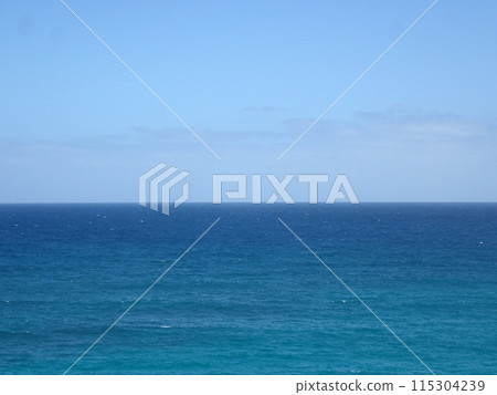 Shallow wavy ocean waters of Waimanalo bay looking into the pacific ocean 115304239
