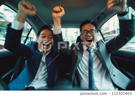 Dynamic Duo: Asian Business Partners Embrace Success on the Go 115305463