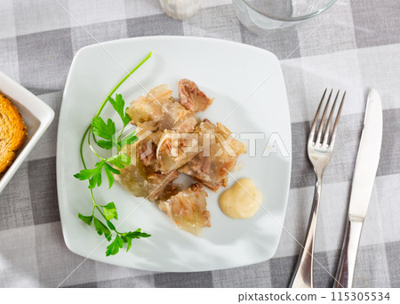 Pieces of homemade pork aspic, meat jelly Pieces of homemade pork aspic, meat jelly 115305534