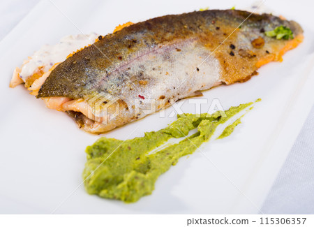 Grilled fillets of trout with tartar sauce Grilled fillets of trout with tartar sauce 115306357