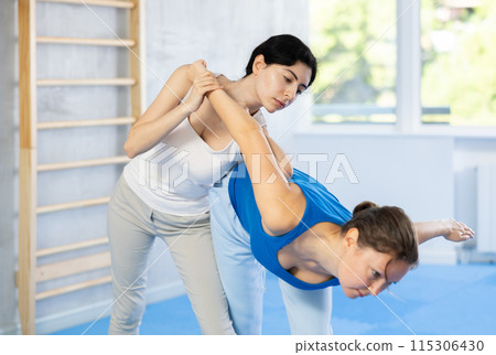 women perform elbow blow women perform elbow blow 115306430