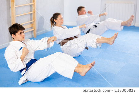 Athlete before martial match performs exercises to strengthen press and improve accuracy of hands Athlete before martial match performs exercises to strengthen press and improve accuracy of hands 115306822