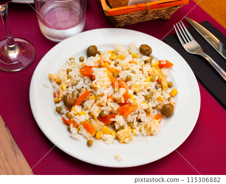 Mix salad with boiled rice, corn and omlette at plate Mix salad with boiled rice, corn and omlette at plate 115306882