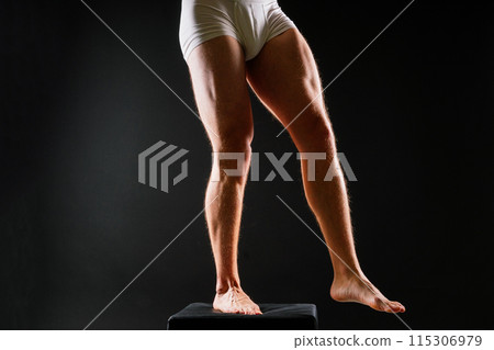 Panties on a sexual body. Guy or sexy macho with strong muscles, Athlete wearing white underwear. 115306979