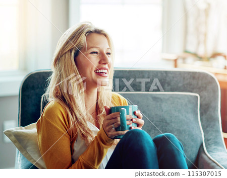 Happy, coffee and woman on sofa in home for relaxing, chill and calm with drink, beverage and cappuccino. Smile, morning and person with cup, tea and mug in living room for wellness, rest and break Happy, coffee and woman on sofa in home for relaxing, chill and calm with drink, beverage and cappuccino. Smile, morning and person with cup, tea and mug in living room for wellness, rest and break 115307015