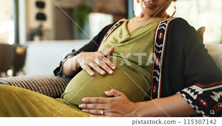 Pregnant, stomach and hands of woman on sofa for wellness, maternity health and resting in home. Pregnancy, parenting and person touch tummy for comfort, love and care for motherhood in living room 115307142