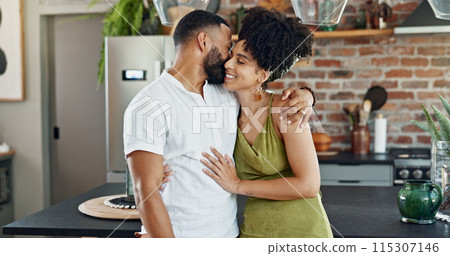 Kitchen, love and happy couple hug in home for bonding, loving relationship or commitment together. Dating, marriage and man and woman embrace for affection, romance or love in new house or apartment 115307146