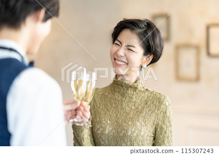 A toasting with wine 115307243