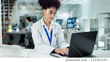 Scientist, woman and typing on laptop in laboratory, medical professional and bioinformatics analysis online for research. Innovation, information study and recording experiment, data and results 115307247