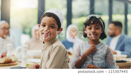 Portrait, happy kids and Muslim family eating dinner for Iftar, ramadan and siblings celebrate Eid mubarak in home. Face, smile and Islamic children together at lunch for food, fasting or religion Portrait, happy kids and Muslim family eating dinner for Iftar, ramadan and siblings celebrate Eid mubarak in home. Face, smile and Islamic children together at lunch for food, fasting or religion 115307445