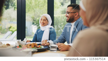 Islamic, family and dinner in home for eid, muslim celebration and serving food on dining table. Ramadan, culture and religious gathering with conversation, eating and people bonding with lunch 115307514